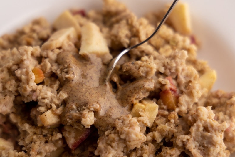 Baked oatmeal topped with almond butter