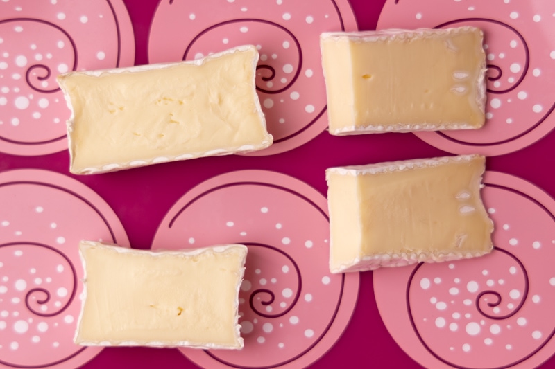 Brie slices on a silicone mat
